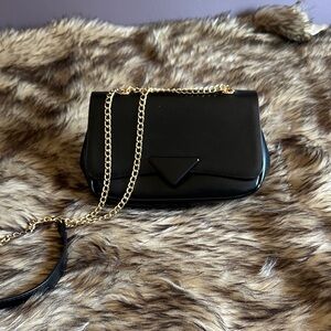 Brand new crossbody purse.